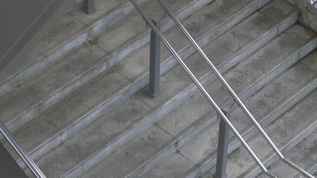 Aerial View of Concrete Stairs with Handrail and Orange Tactile Paving for Accessibility