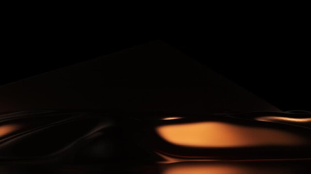 Abstract glossy bronze form rises from a dark fluid surface, unfolds into a geometric shape and gradually disappears into darkness on a black background.