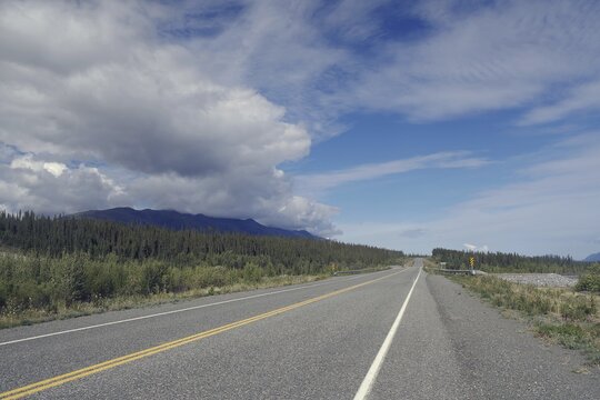 Endless road without traffic, forest, adventure, wilderness, Alaska Highway, Yukon Territory, Canada