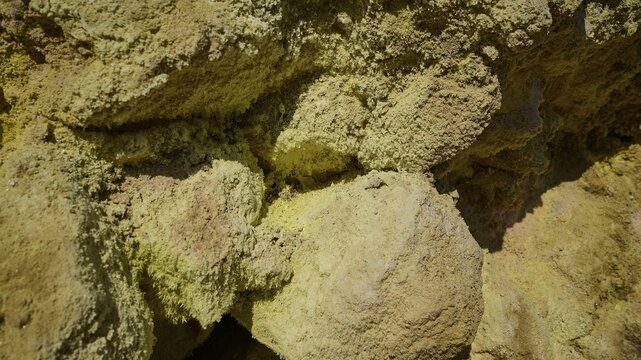 Detailed view of a rock face with yellow and greenish mineral deposits, volcanism, volcanic island, Polyvotis crater, Nisyros, Dodecanese, Greek Islands, Greece