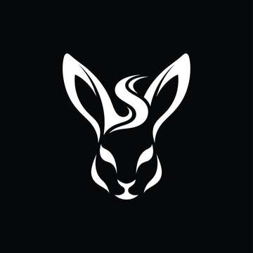 Minimalist white rabbit head logo design on black background with wildlife