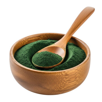 Green spirulina powder in a wooden bowl with a small spoon isolated on transparent background