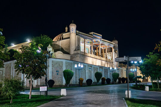 Islam Karimov mosque at night in Samarkand, Uzbekistan. Illuminated white marble building. Presidential memorial complex.