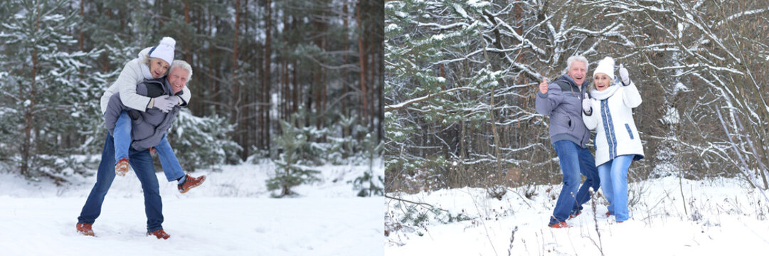 Happy elderly couple walking in snowy winter forest