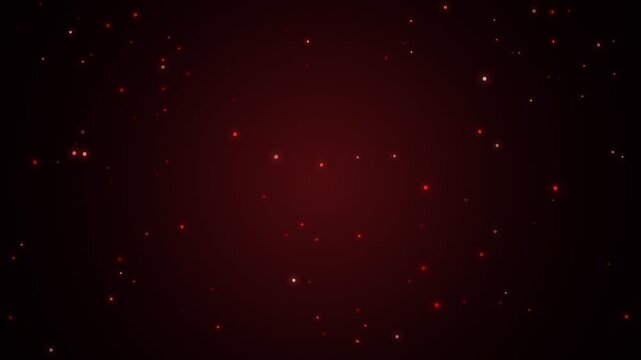 Red particles float and sparkle in cinematic slow motion against a dark background with subtle grid texture