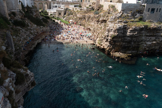 aerial view of lama monachile beach in polignano a mare, apulia, italy