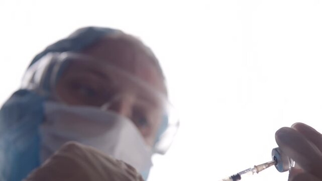 Doctor Filling Syringe With Vaccine Medicine Liquid From Ampoule Bottle. Medical Immunization Injection Treatment 