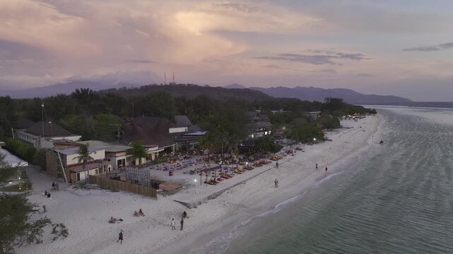 Natural landscape of beachfront hotel view on Gili Trawangan island in Lombok, Indonesia at dusk