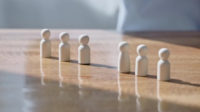 Wooden peg figures representing diversity and organization in human resources