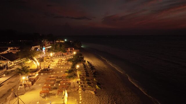 Natural landscape of beachfront hotel view on Gili Trawangan island in Lombok, Indonesia at dusk