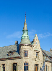 Ålesund Art Nouveau building with turret and spire © photoopus