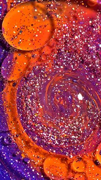 Abstract Macro Liquid Swirl with Orange Bubbles and Purple Glitter