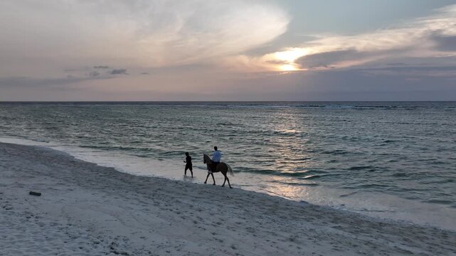 horse riding along the beach of Gili Trawangan island in Lombok Indonesia