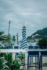 Obraz premium outdoor restaurant overlooking La Concha Bay in San Sebastian, Basque Country, Spain