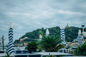 Obraz premium outdoor restaurant overlooking La Concha Bay in San Sebastian, Basque Country, Spain
