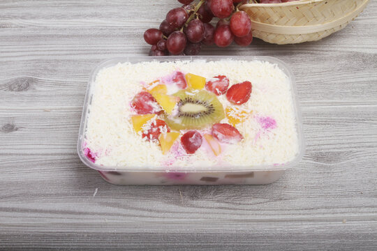 cheesecake with berries on table