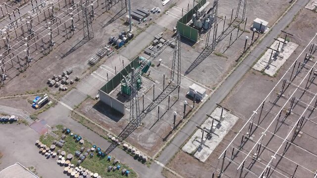 Aerial view of the Terna Baggio electrical substation in Settimo Milanese, Milan, Italy showing high-voltage transmission lines
