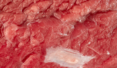 Obraz premium Raw beef steak macro pattern, red meat slice closeup