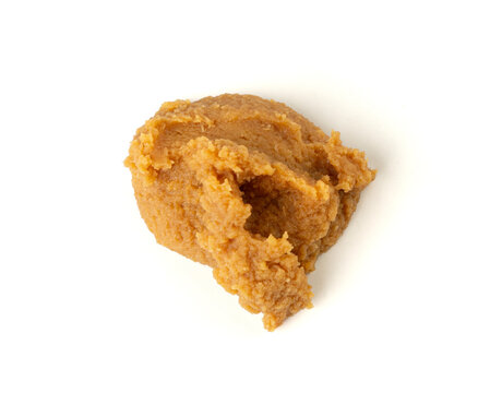 Miso paste isolated. Japanese shiro miso seasoning sauce, fermented soybean spread, brown soy cream