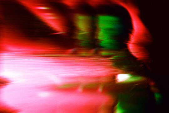 Unrecognizable female avatar glows in abstract glitch matrix