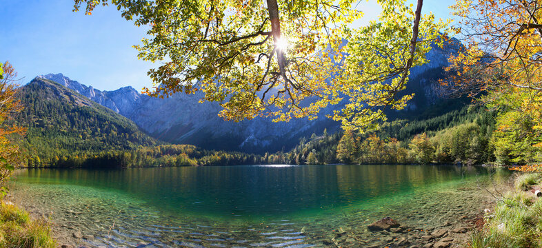 Austria, View of Hinterer Langbathsee lake and mountains in background