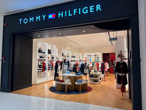 Hanoi, Vietnam - September, 5, 2026:  A modern retail store featuring the Tommy Hilfiger brand. The entrance showcases neatly arranged clothing displays