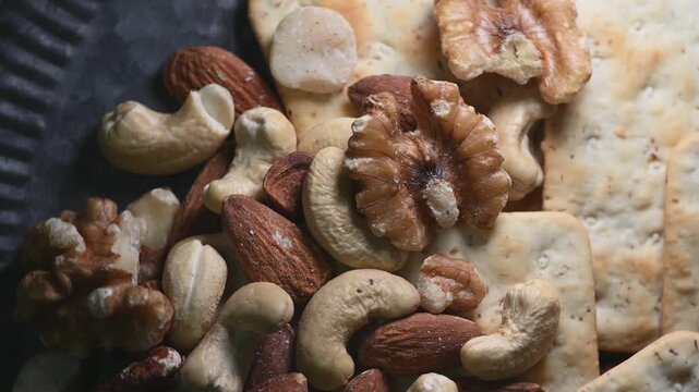 Soda Crackers and Assorted Nuts in a Close Up Still Life