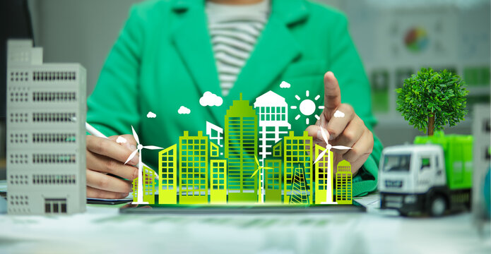 Sustainable green building, Eco-friendly building and city, Green business concept, Modern green city building model, Sustainable energy, Environmental sustainability goals for 2050.