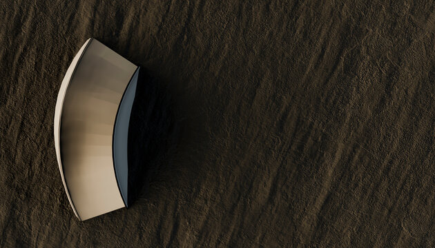Inverted wooden boat resting on textured beach sand