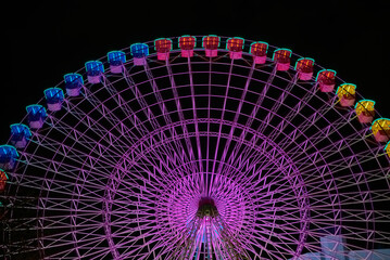 Naklejka premium Stunning ferris wheel attraction glowing as part of Vigo s holiday celebration