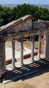 Gentle aerial perspective of the Agonothetes monument within the Apollonia archaeological site, a significant historical site located in Fier, Albania