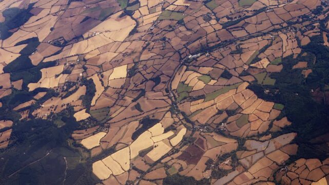 Aerial Over UK Landscape near Hamlet of Ashcombe in Devon UK. Fields Browned After Prolonged Drought in Summer 2026.