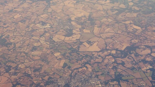 High Aerial Showing Huge Scale of French Countryside with Browned Fields After Heatwaves.