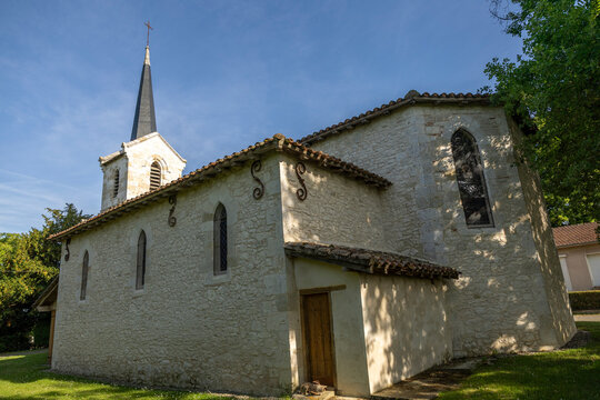 Exterior view of a stone village church with a bell tower, Gers, Saint Georges, France