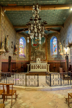 Ornate church apse with altar painting of Saint George and the dragon, Gers, Saint Georges, France