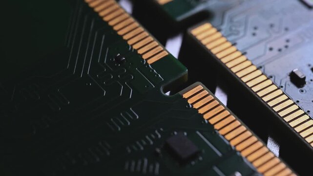 Macro Close Up of DDR4 RAM Gold Contacts with Shifting Colorful Light