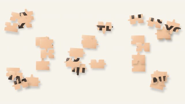 A collection of physical puzzle pieces assembles mechanically to reveal a Thank You message.