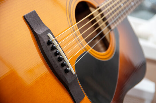 Acoustic guitar with very shallow depth of field