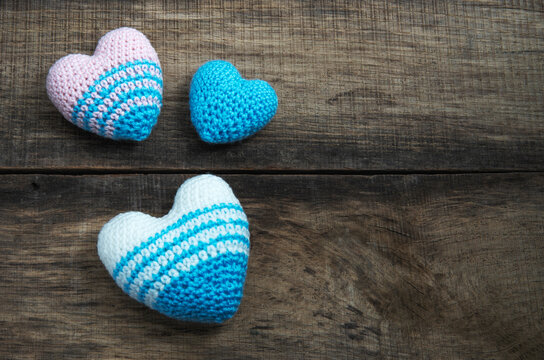 Love hearts on wooden texture background, valentines day card concept