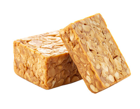 Two blocks of fresh soybean tempeh, transparent background PNG.