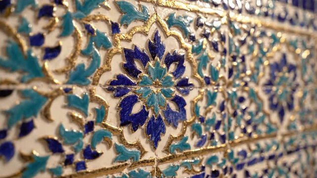 Ornate blue and gold ceramic tile pattern close-up