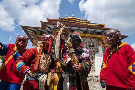 Masked cham dancers with cymbals and a hand drum at a festival, Thimphu District, Thimphu, Bhutan