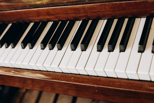 Piano keys arranged in a pattern with black and white colors showing musical instruments