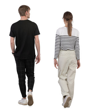 Back view of two people walking. Isolated on white and transparent background