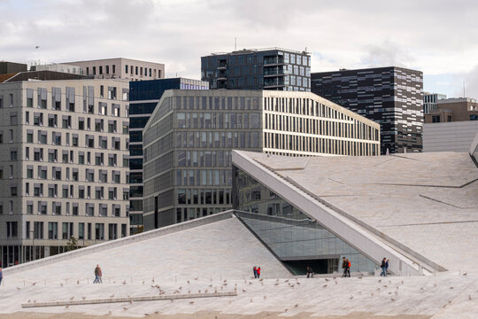 Oslo panorama creates a striking urban foreground with modern office buildings behind in a layered city composition