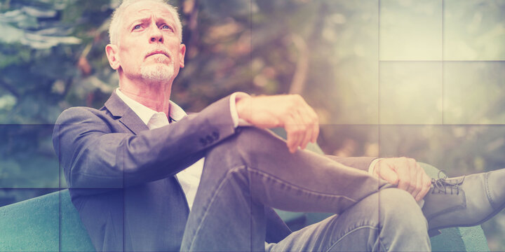 Portrait of thoughtful mature man, light effect, geometric pattern