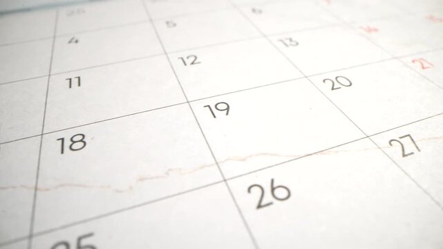 2027 calendar switching panels with black digits. Macro view date