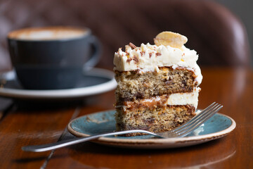 Delicious Banana Cake Slice With Coffee in Cozy Cafe Setting © JPH Photo