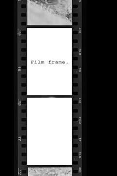Vertical 35mm film strip template with two blank white frames on black background.