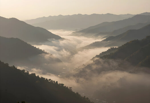 Environmental conservation and wilderness travel, misty mountain valley at sunrise with soft morning light and rolling fog over remote highland landscape